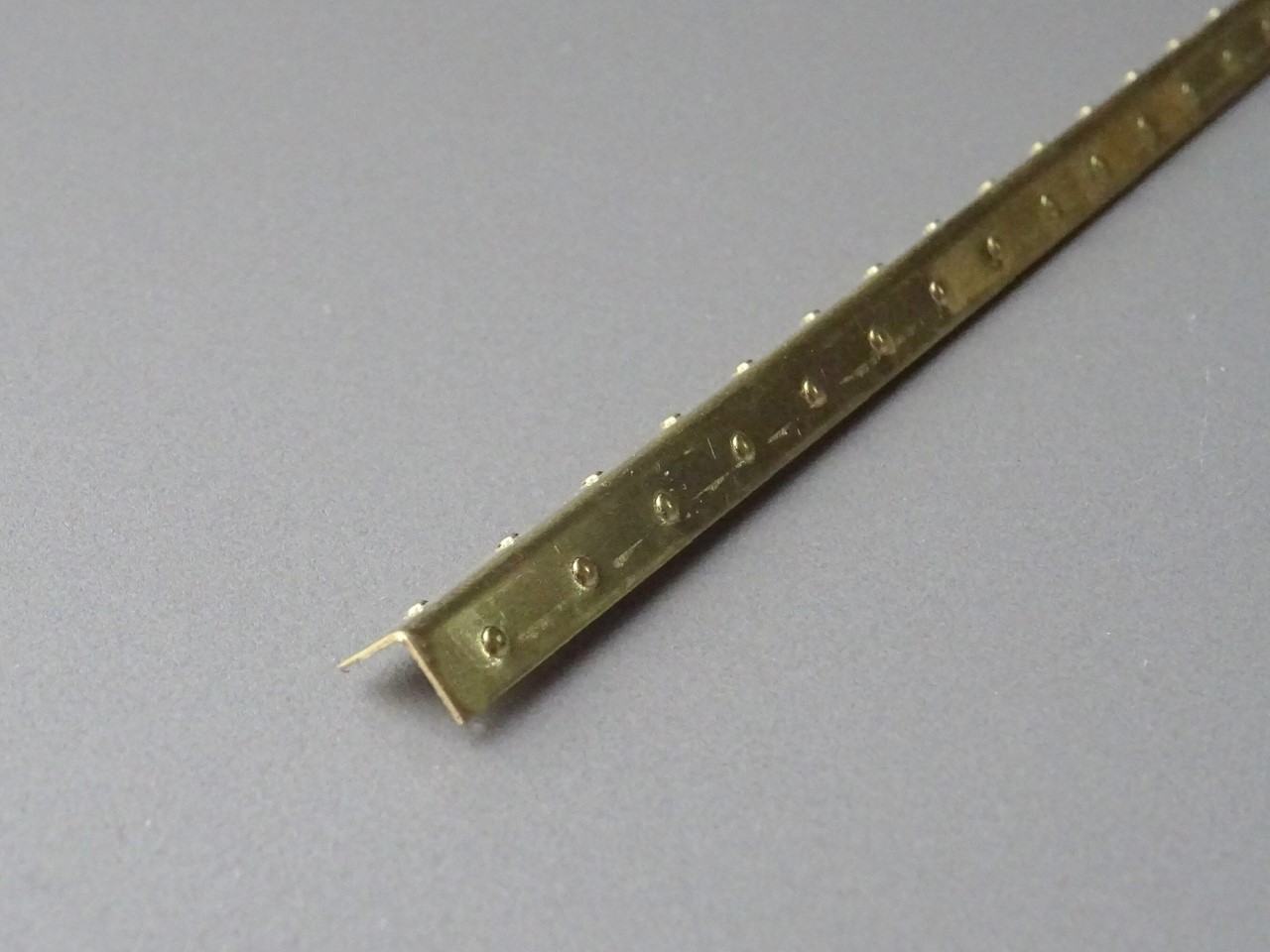 Picture of Brass Rivet angle